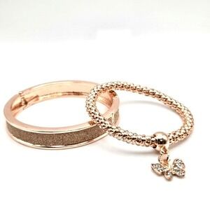 Pair of Rose Goldtoned Bracelets Glitter Clamper and Stretch Metal with Charm